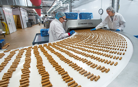 Image of Almond Roca factory workers inspecting candy